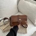 Brown faux leather baguette bag with white stitching and gold buckle hardware - One Size / Tan
