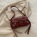 Vintage burgundy shoulder bag featuring silver rivets and edgy punk aesthetic design - Red