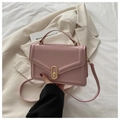 Bolso de mano rosa en cuero mate con elegante cierre giratorio dorado y asa superior - Rosa