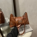 Retro brown PU leather tote with silver rivets and buckle in a classic hobo style - Brown