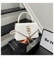 Borsa a tracolla bianca in ecopelle con trama coccodrillo e fibbia a S dorata - Bianco