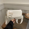 Minimalist white leather saddle bag with wide shoulder strap and gold-tone hardware - White