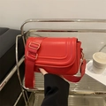 Chic red saddle shoulder bag with U-shaped stitching and wide adjustable fabric strap - Red
