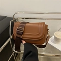 Retro dark brown saddle bag with U-shaped embossed lines and wide nylon strap - Brown