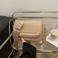 Chic apricot saddle crossbody bag with wide fabric strap and matte faux leather finish - Khaki