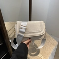 Chic beige textured saddle bag with stylish silver-grey wide woven shoulder strap - Faux Suede White