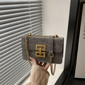 Grey leopard print suede crossbody bag with gold chain strap and geometric metal buckle - Gray