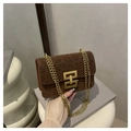 Detail of leopard print suede shoulder bag with elegant gold geometric metal buckle - Coffee