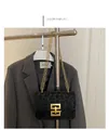 Women's black leopard print crossbody bag with gold chain strap and geometric buckle - Black