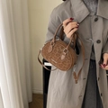 Chic leopard print Boston bag with brown leather handles and Creative Cat logo - Brown