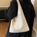 Minimalist beige oversized tote bag in soft matte leather with metal rivet detail - Off White