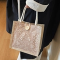 Pink linen tote bag with white floral embroidery and woven rope handle detail - Khaki