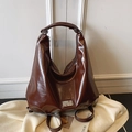 Fashionable dark brown glossy PU leather tote bag with silver logo detail and wide handle - Coffee No Charm