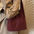 Deep red leopard print suede tote bag with silver buckle and crossbody strap - Burgundy