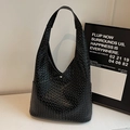 Large black woven tote bag with magnetic closure and spacious bucket design - Black