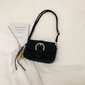 Elegant black suede crossbody bag with golden horseshoe buckle and sports charm detail - Black With Baseball Pendant
