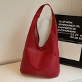 Large red woven leather tote bag with minimalist hobo silhouette and single shoulder strap - Burgundy