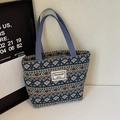 Ethnic style canvas tote bag with geometric diamond patterns and light blue handles - Large / Open Top / Blue