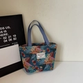 Ethnic floral jacquard tote bag in blue with pink flower patterns and woven handles - Blue Small (Open)