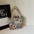 Ethnic tote bag with tropical floral print and monstera leaves on white background - Khaki Small (Open)