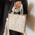 Cream linen lunch tote bag with brown heart patterns and rope handles - White
