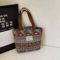 Ethnic style tote bag with colorful geometric patterns and durable woven handles - Brown Small (Open)