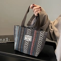 Ethnic style woven tote bag with brown handles and geometric patterns in neutral tones - Open Top / Coffee / Small