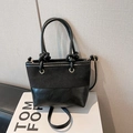 Vintage black bucket bag with suede paneling, knotted handles and gold hardware detailing - Without Pendant / Black