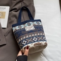 Ethnic style canvas bucket bag with elephant print and rustic jute bottom detail - Coffee And Navy Blue