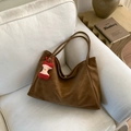 Brown large capacity tote bag with dual straps and a red apple plush charm detail - With Pendant / Brown