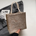 Champagne rose jacquard linen tote bag with natural rope handles in lifestyle setting - Khaki Zipper Style