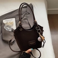Dark brown leather bucket bag with baseball charm and long handles in a retro style - Coffee With Baseball Charm