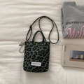 Green leopard print canvas handbag with crossbody strap and heart charm detail - Heart Chain Pendant Style / Green