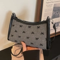 Borsa sottobraccio retrò in lana grigia con motivi a fiocco neri e cinturini in pelle - Fiocco
