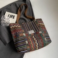 Ethnic knit bucket bag with colorful wavy patterns and brown shoulder strap - Large / Zipper Style / Coffee