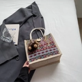 Bohemian jute handbag with geometric embroidery and plush pompom for trendy women - Red Button Style With Brown Elf Charm