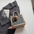 Ethnic pattern tote bag with knot handle and brown monster charm on gray fabric - Blue Button Style With Brown Elf Charm
