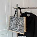 Large capacity tote bag with zebra print pattern and durable black shoulder straps - Black