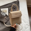 Elegant beige vertical square crossbody bag with metallic studs on a white bed - Rice White (No Pendant)