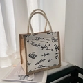 Compact canvas lunch bag with graffiti prints and thick cotton rope handles - White Graffiti Print With Zipper