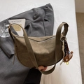 Army green hobo bag in matte finish with teddy bear charm and woven keychain - Green With Bear Charm