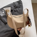 Beige faux leather half-moon shoulder bag with plush star charm and branded patch - Rice White With Star Bear Charm