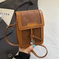Brown textured leather crossbody phone bag with stylish flap and round metal pendant - Brown No Pendant