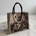 Retro beige floral canvas tote bag with black woven handles and large pearl charm decoration - Black Large