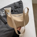 Minimalist beige dumpling shoulder bag in matte PU leather with rectangular brand patch - Rice White (No Pendant)