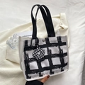 Minimalist white grid canvas handbag with black handles and floral checkerboard pendant - Flower Pendant / White Grid