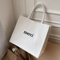 Borsa tote in tela bianca con scritta merci nera e stile francese minimalista - Bianco
