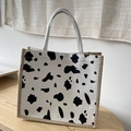 Linen tote bag with black and white cow print and natural jute trim detailing - White Cow Print