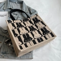 Sac fourre-tout en toile beige et noir avec motif de grille en silhouettes de lapin - Noir