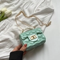 Mint green jelly handbag with quilted texture, pearl handle and gold chain strap - Green